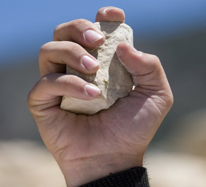 Stone in hand